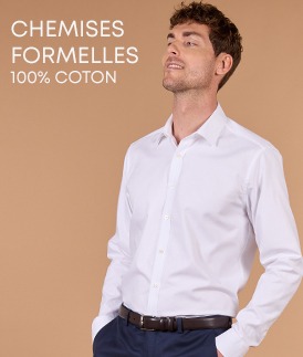 Homme portant une chemise formelle blanche en coton