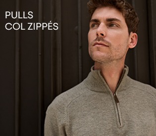 Homme portant un pull col zippé gris